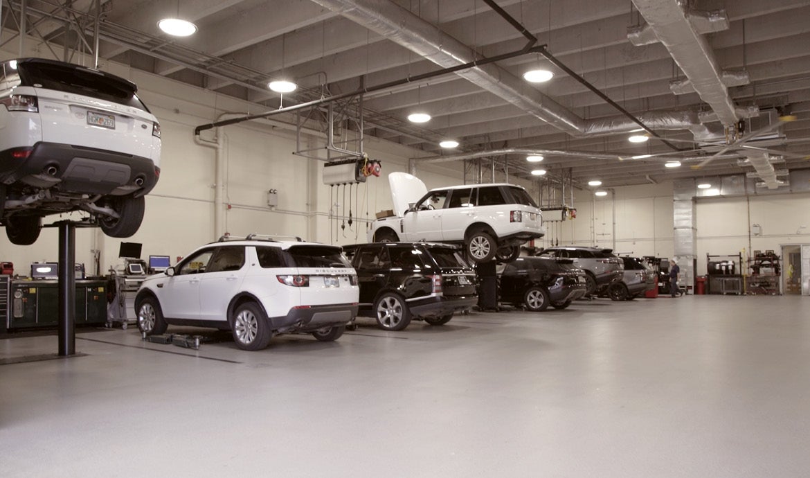 Luxury vehicles being serviced in Naples Luxury Imports Service center